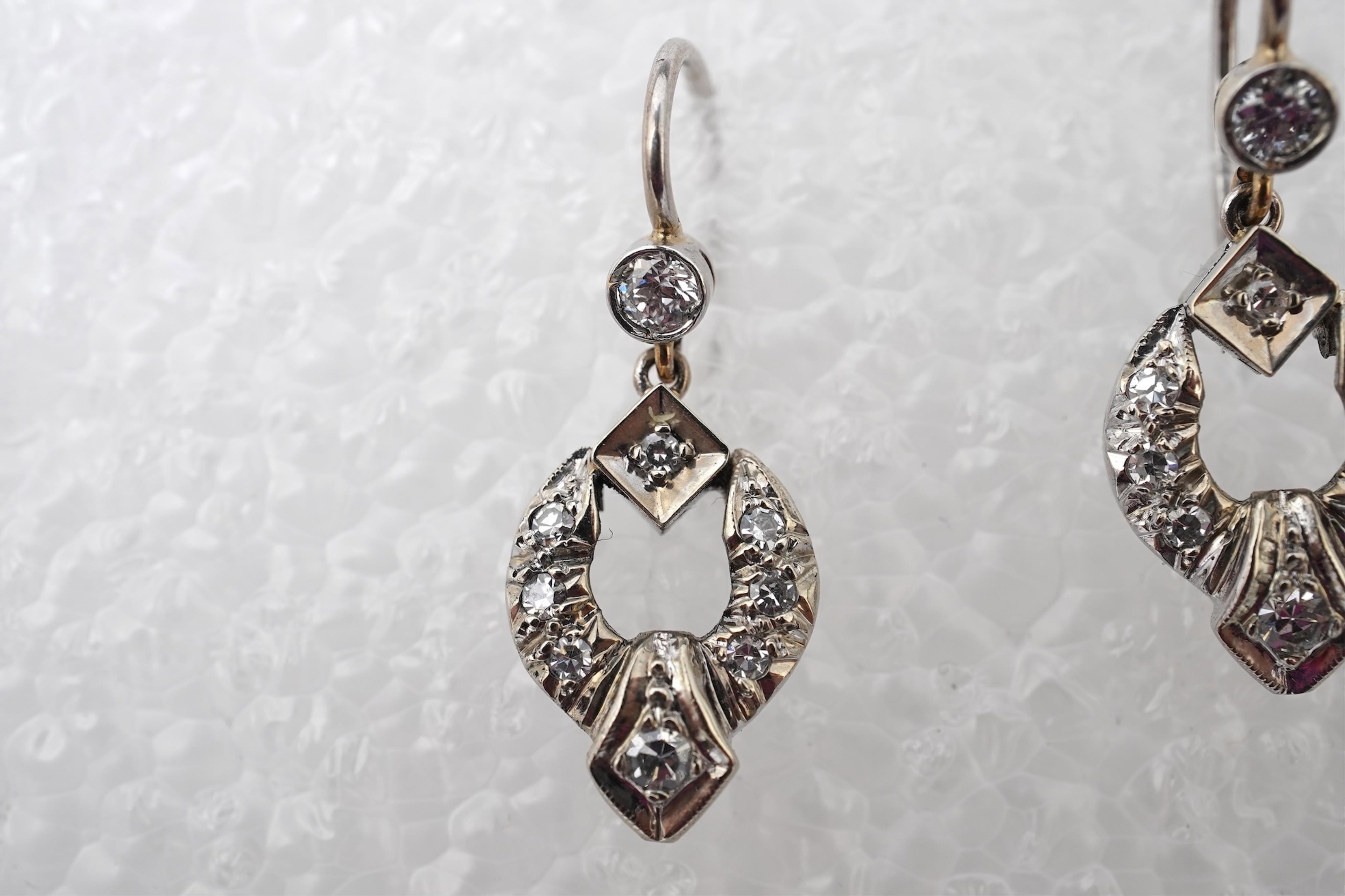 A pair of diamond earrings, mid 20th century and later